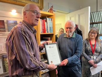 Bryce Wilson receiving his Curator Emeritus title from Museum Chair Ian Johnstone (Credit Rebecca Marr) Bryce Wilson receiving his Curator Emeritus title from Museum Chair Ian Johnstone (Credit Rebecca Marr)