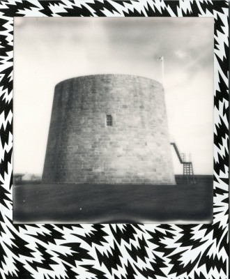 Hackness Martello Tower, Hoy photograph of a tower/defensive structure. This photograph has a border of geometric design