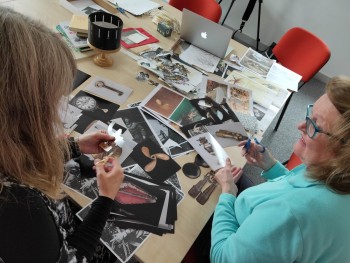 participants cutting out photos of artefacts from Stromness Museum collection, ready to bring them to life. participants cutting out photos of artefacts from Stromness Museum collection, ready to bring them to life.