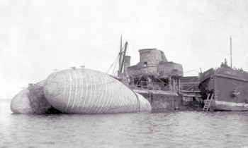 Scapa Flow Salvage & Shipbreaking Co. raising a destroyer with balloons © Orkney Library and Archive