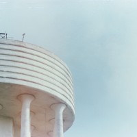 photograph of a skyline with a water tower to the left